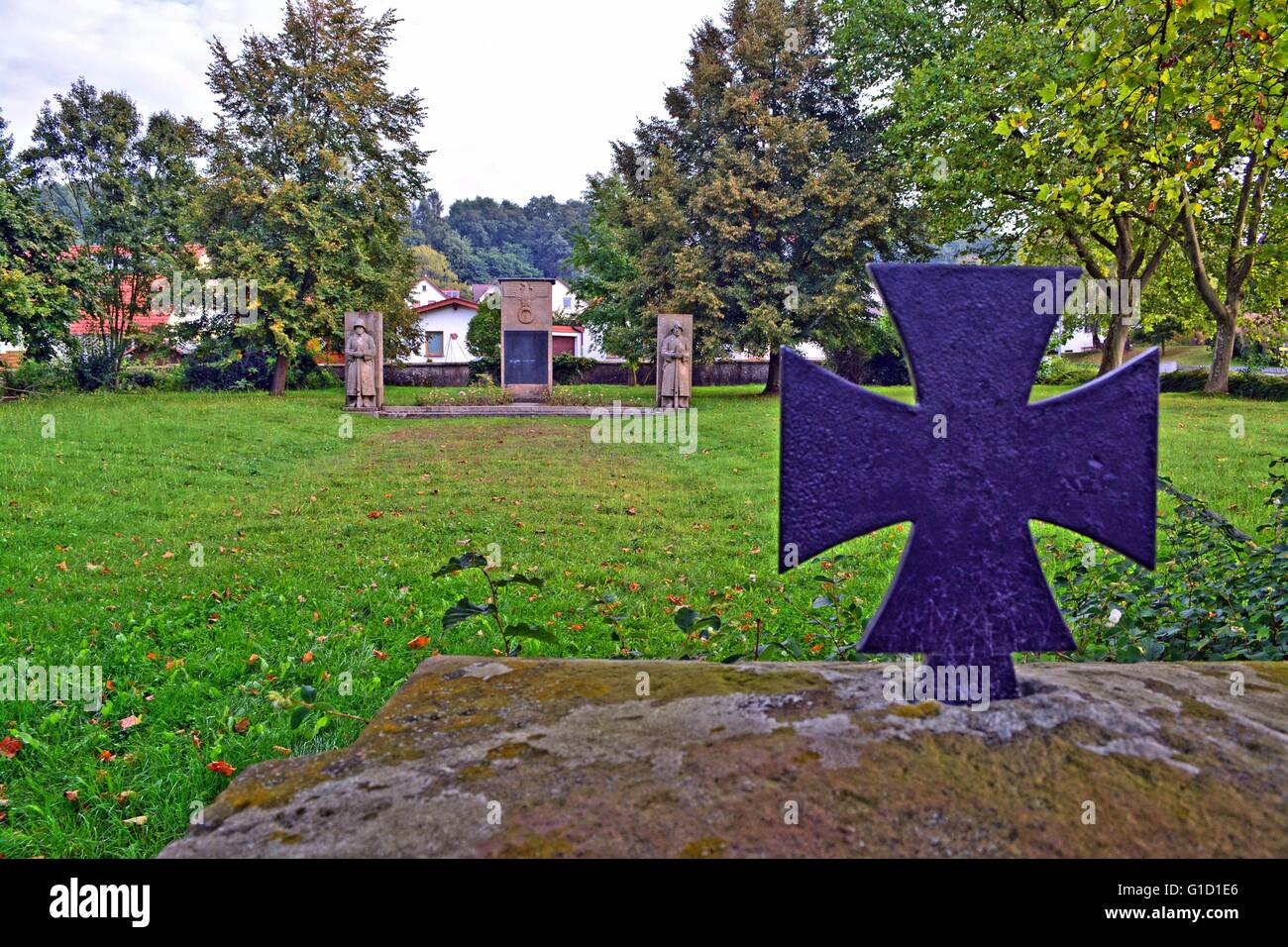 German World War memorial, erected 1935, in Saarland. The Iron Cross in front of the memorial - view from the entrance Stock Photo
