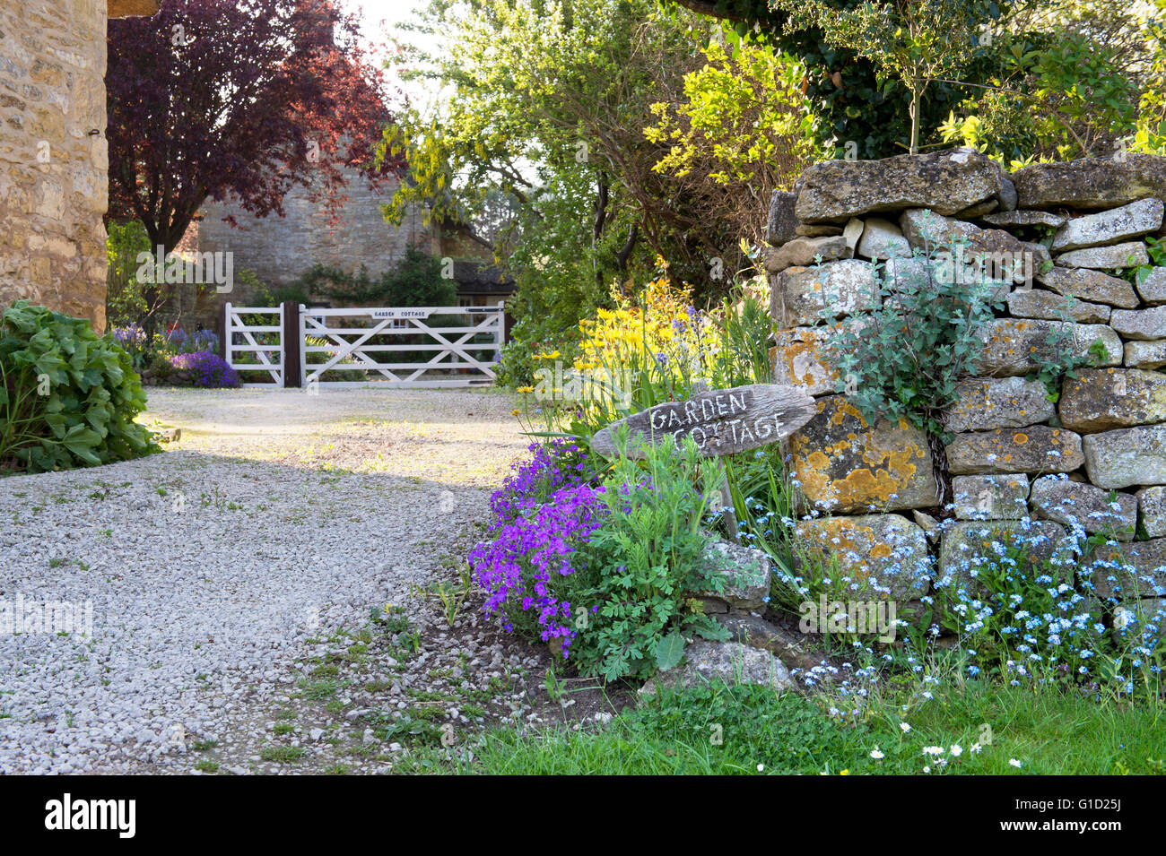 Garden cottage sign outside a house in the cotswold village of Broad Campden, Gloucestershire, England Stock Photo