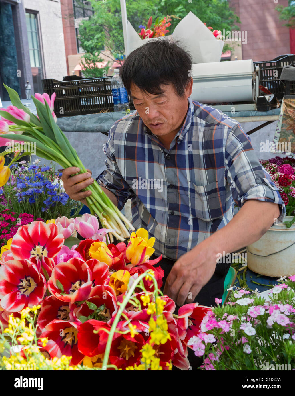 Charlotte, North Carolina - A flower seller on an uptown street. Stock Photo
