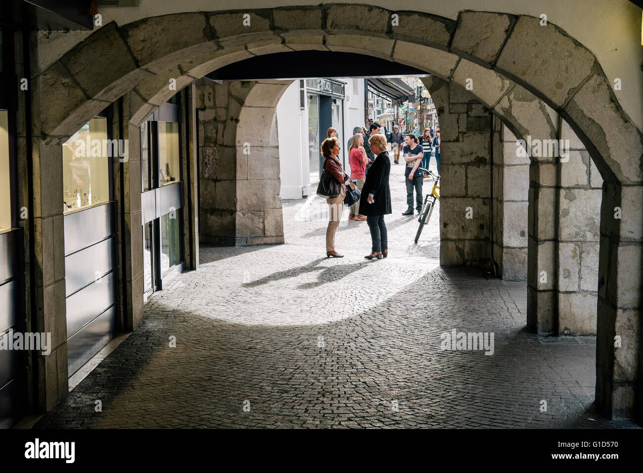 Two woman chatting in the old town of Annecy , Haute-Savoie,  Auvergne-Rhône-Alpes region, France Stock Photo