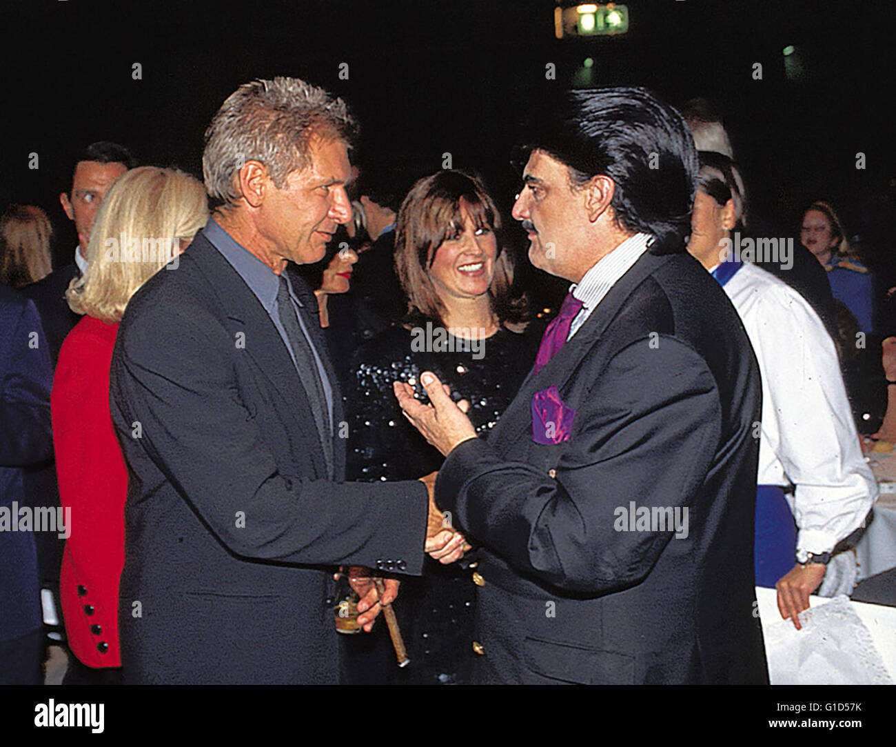 Ford, Harrison / Maria Petersen / Rudolph Moshammer,|Anlass: Premiere 'Air Force One'||Aufgenommen in: München Stock Photo