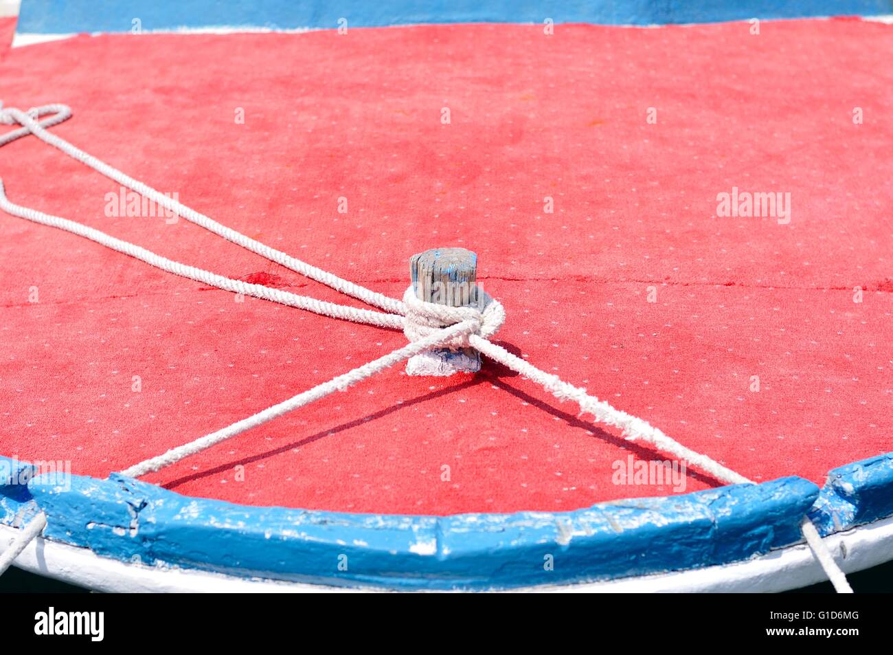 Marine rope on wooden boat Stock Photo