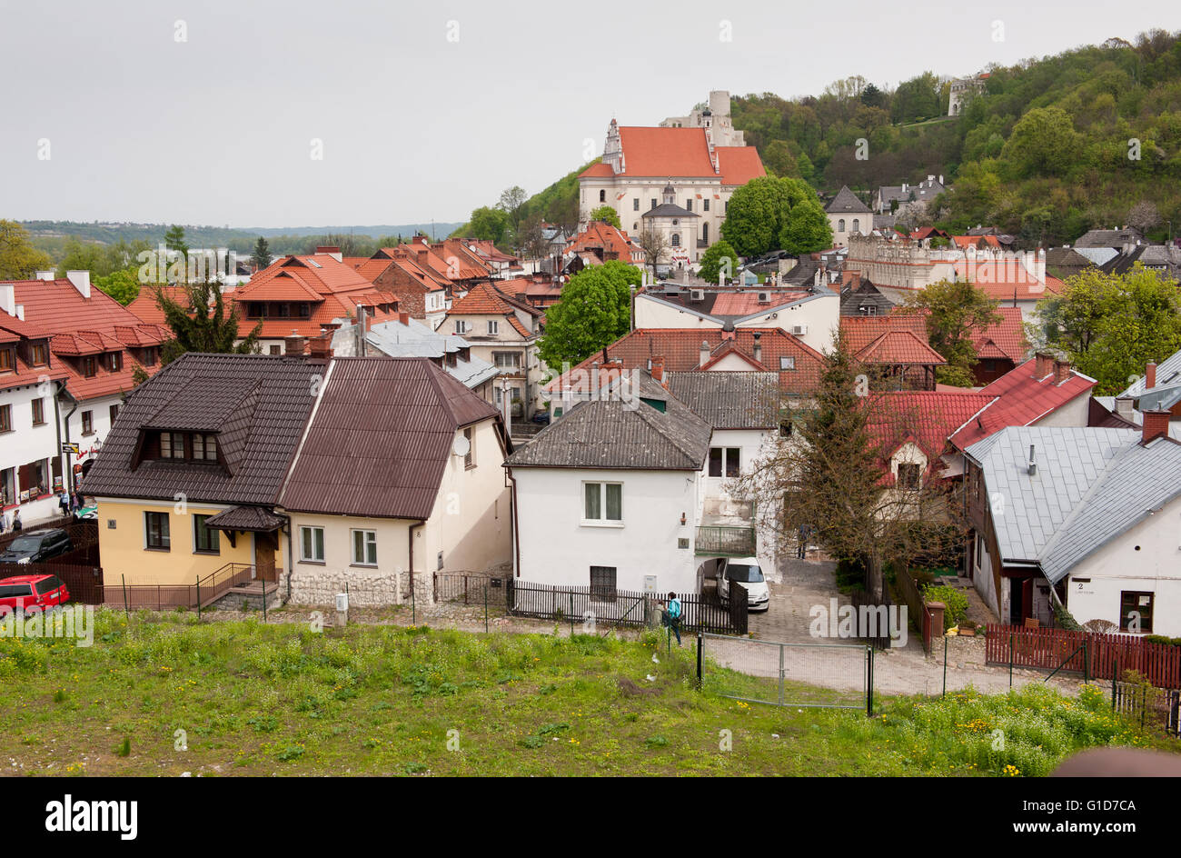 The Parish Church in Kazimierz Dolny, Poland, Europe, picturesque landscape view at building exterior across town. Stock Photo