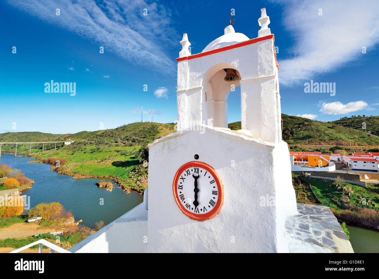 Portugal, Alentejo: Medieval clock tower and view to river Guadiana in Mértola Stock Photo