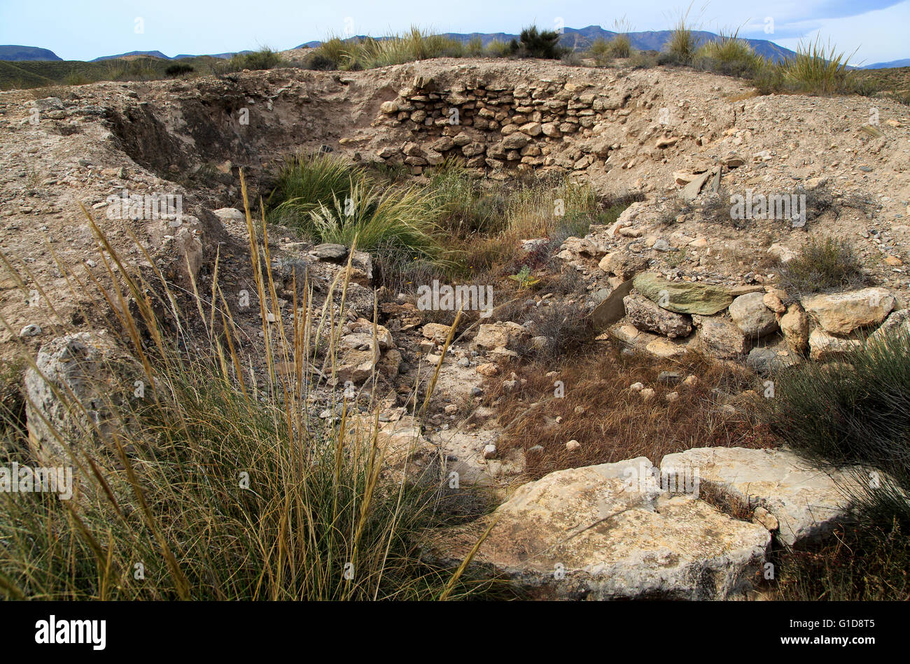 Inside ruined tomb mound Los Millares prehistoric settlement, Almeria, Spain Stock Photo