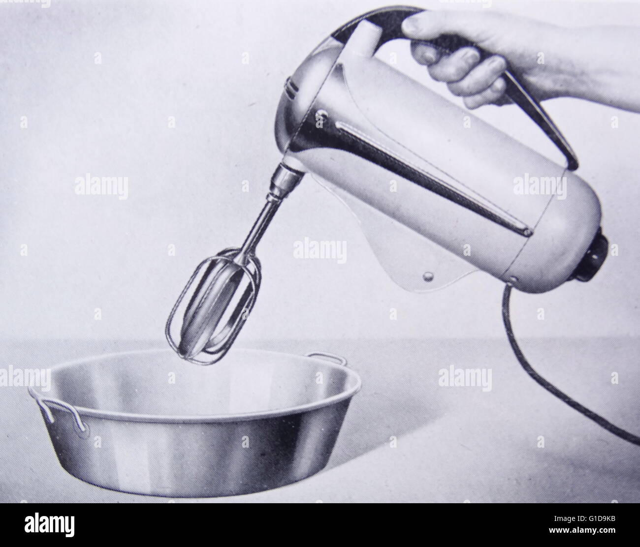 Advert for a hand held food mixer; British 1950 Stock Photo Alamy