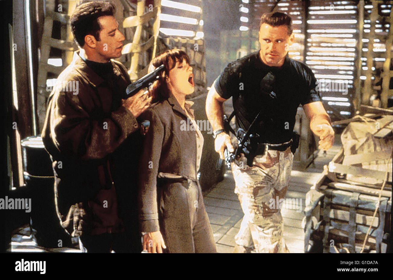 Operation: Broken Arrow / John Travolta / Samantha Mathis / Howie Long, Stock Photo