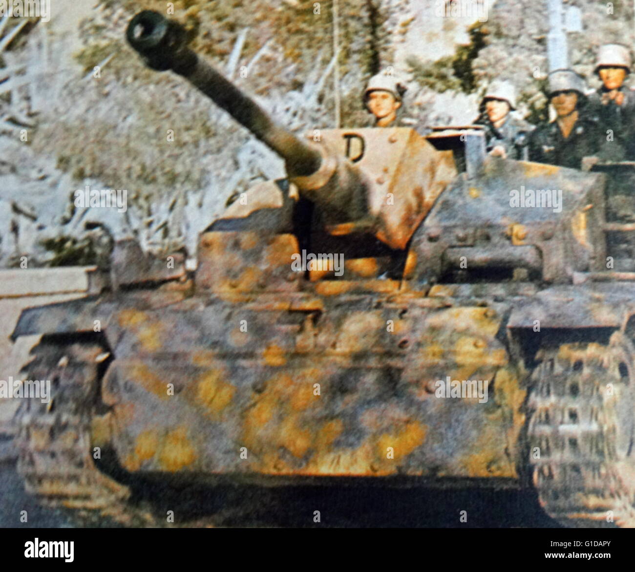 Panzer tank and soldiers during World War II. Originally used for training purposes, these tanks were eventually seen in action. Stock Photo