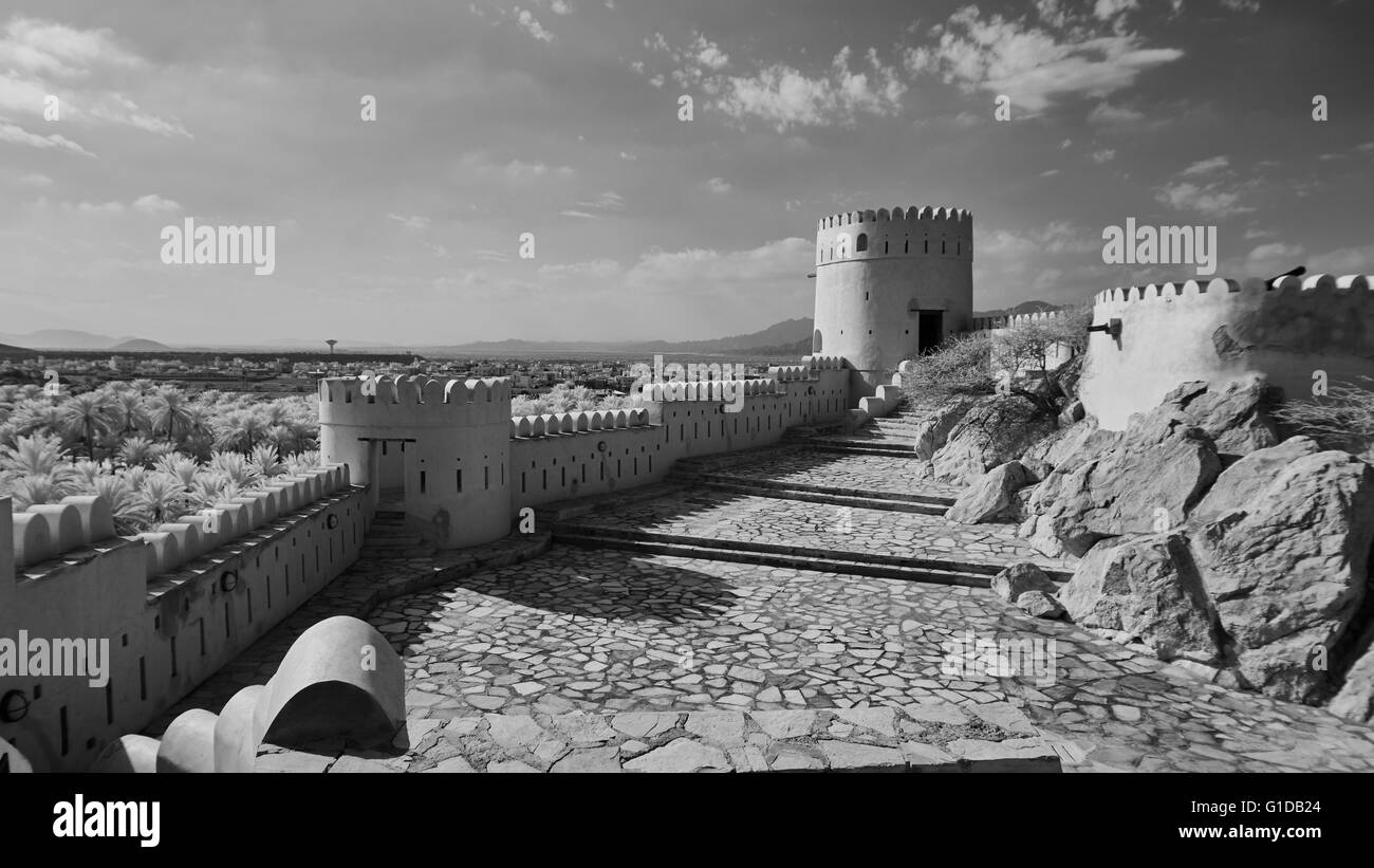 View from the top of a fort of the countryside and sky in black and white Stock Photo