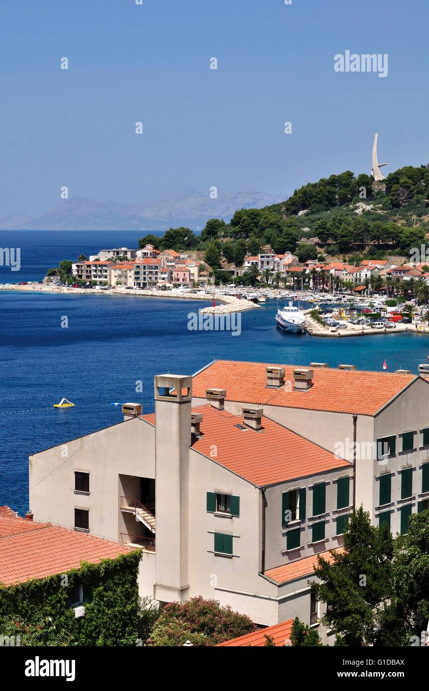 Birdview of Podgora with port and monument Seagull's wings. Croatia. Vertical image Stock Photo