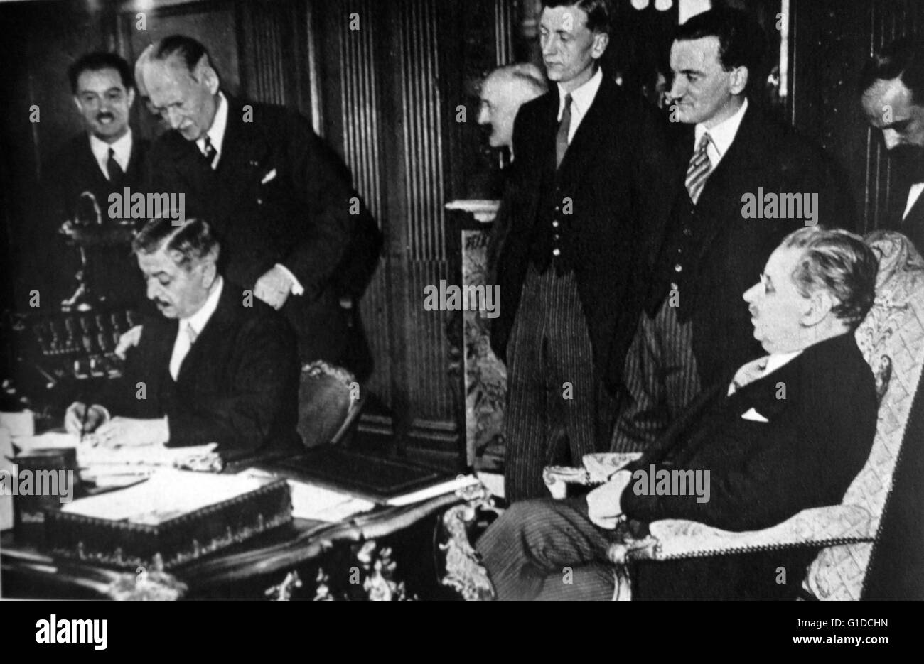 Russian Ambassador Potemkin signs treaty with French Prime Minister Pierre Laval, 1935 Stock Photo