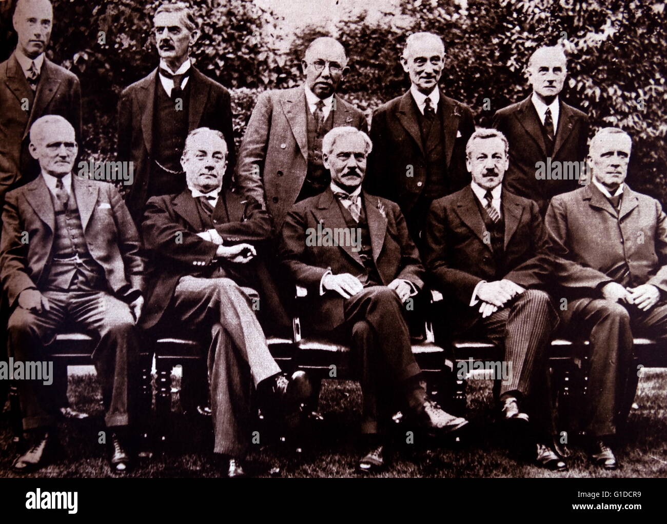 Ramsay MacDonald's national Government in Britain 1931. from left to right  seated: Phillip Snowden, Stanley Baldwin, Ramsay MacDonald, Lord Herbert  Samuel, John Sankey; Standing left to right: P. Cuncliffe-Lister, Neville  Chamberlain, Thomas