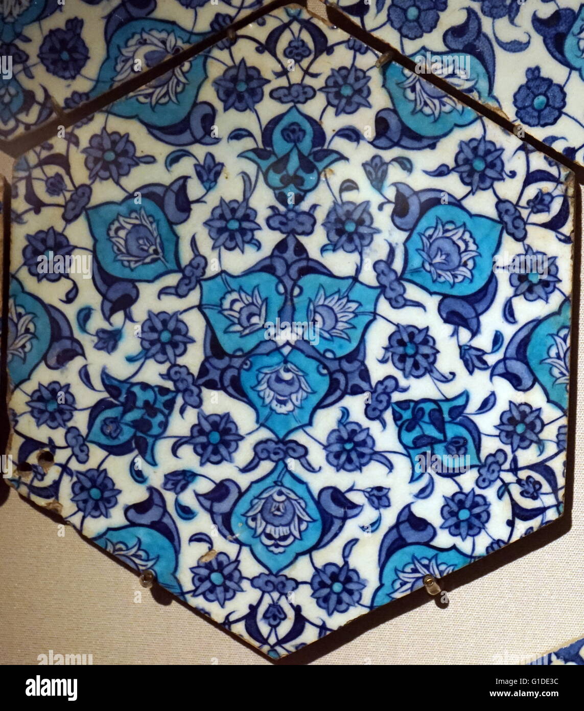 Hexagonal tiles from a panel with arabesque medallion. Dated 16th Century Stock Photo