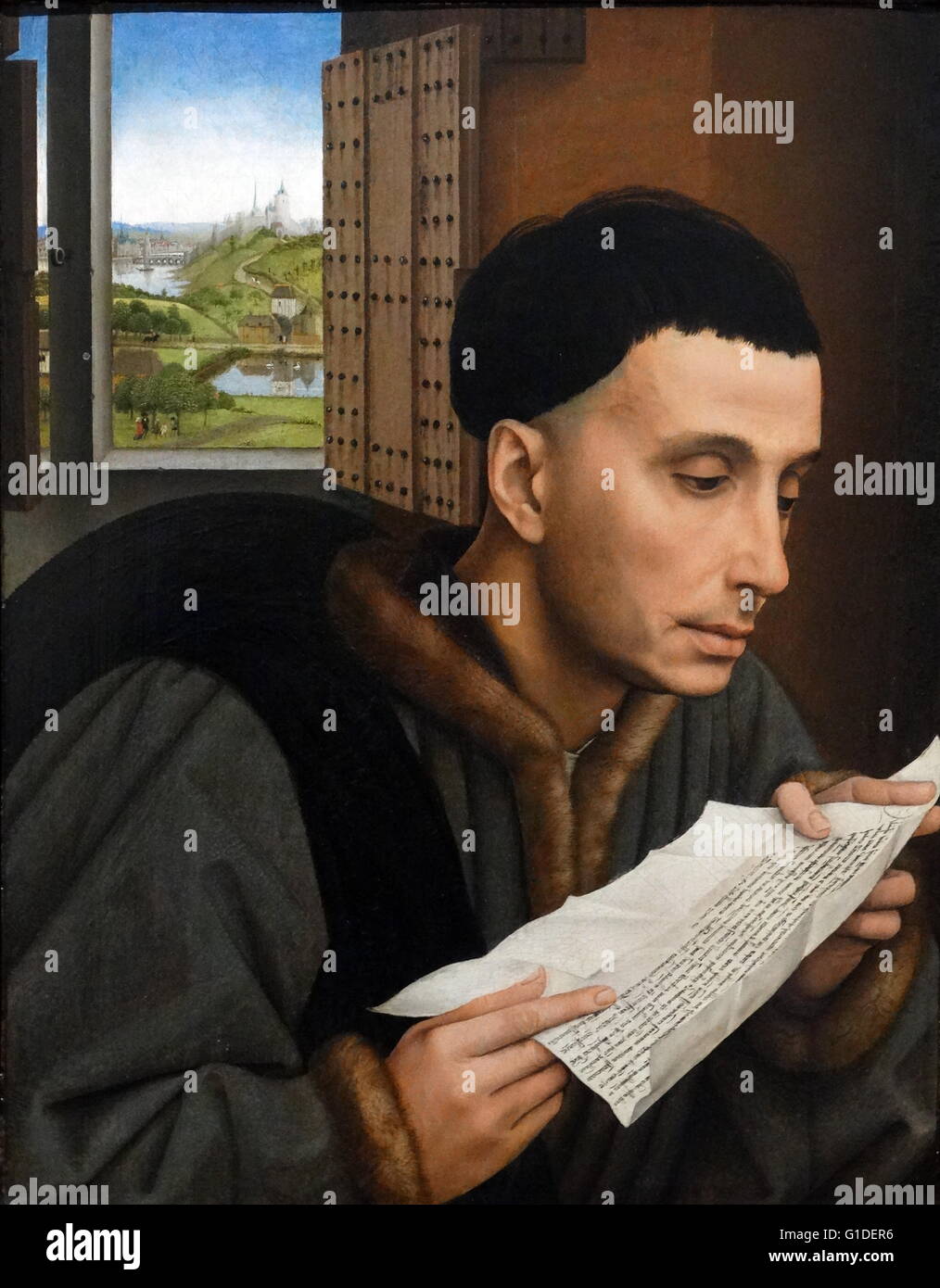 Painting titled 'A Man Reading ' (Possibly Saint Ivo) by the Workshop of Rogier van der Weyden (1400-1464) an Early Netherlandish painter. Dated 15th Century Stock Photo