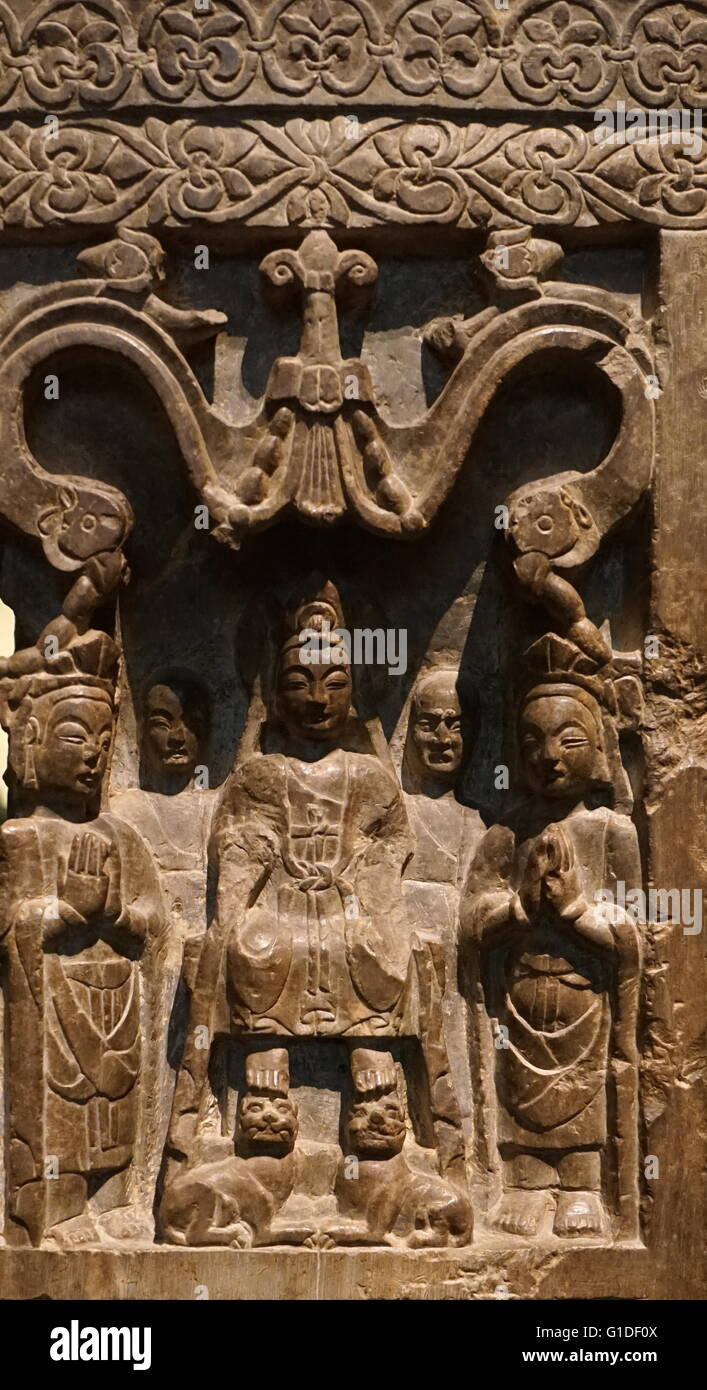 Votive stele of a Chinese Buddhist in limestone from the Northern Qi Dynasty. Dated 6th Century. Stock Photo