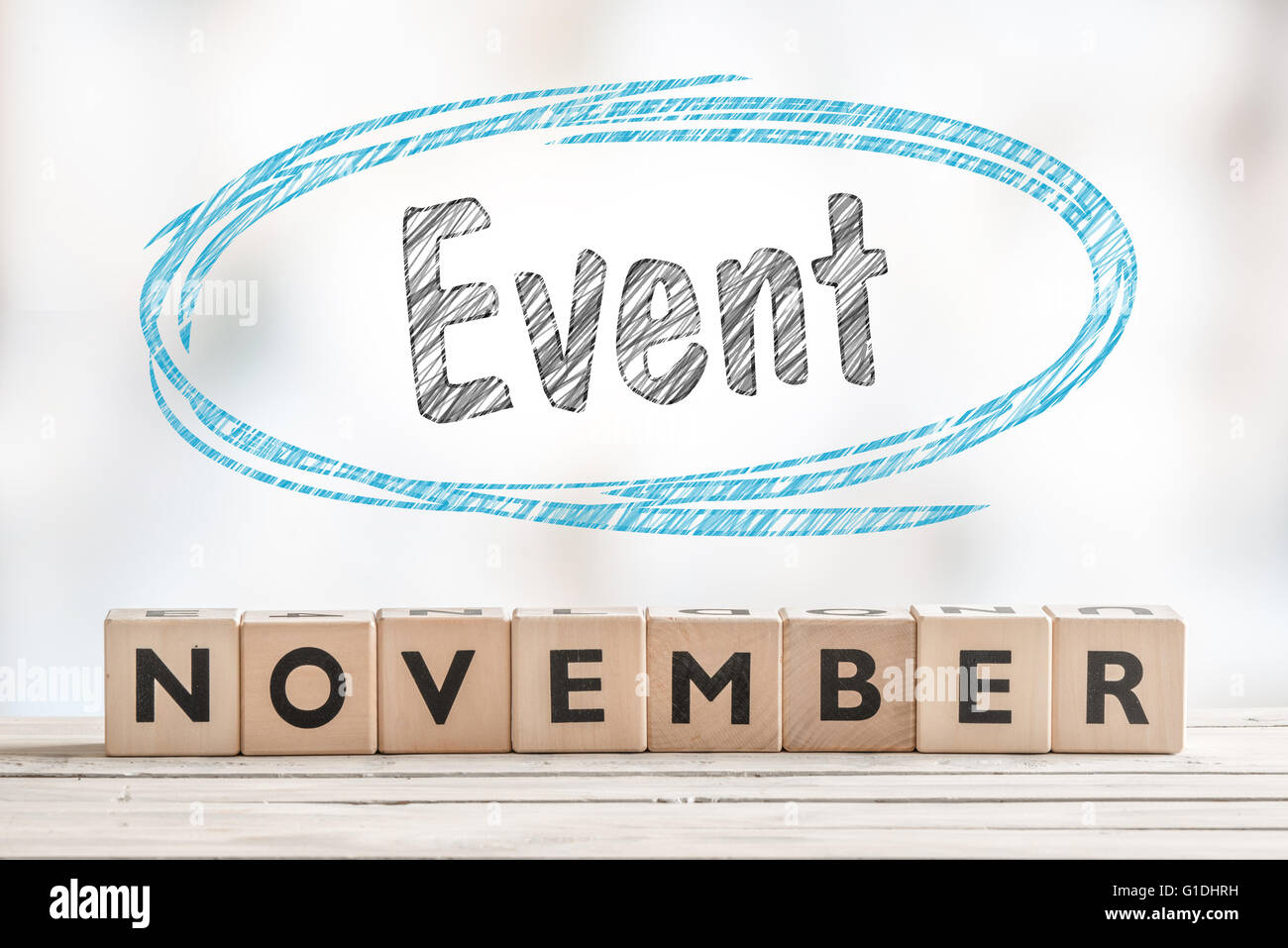 November event sign with wooden blocks on a stage Stock Photo