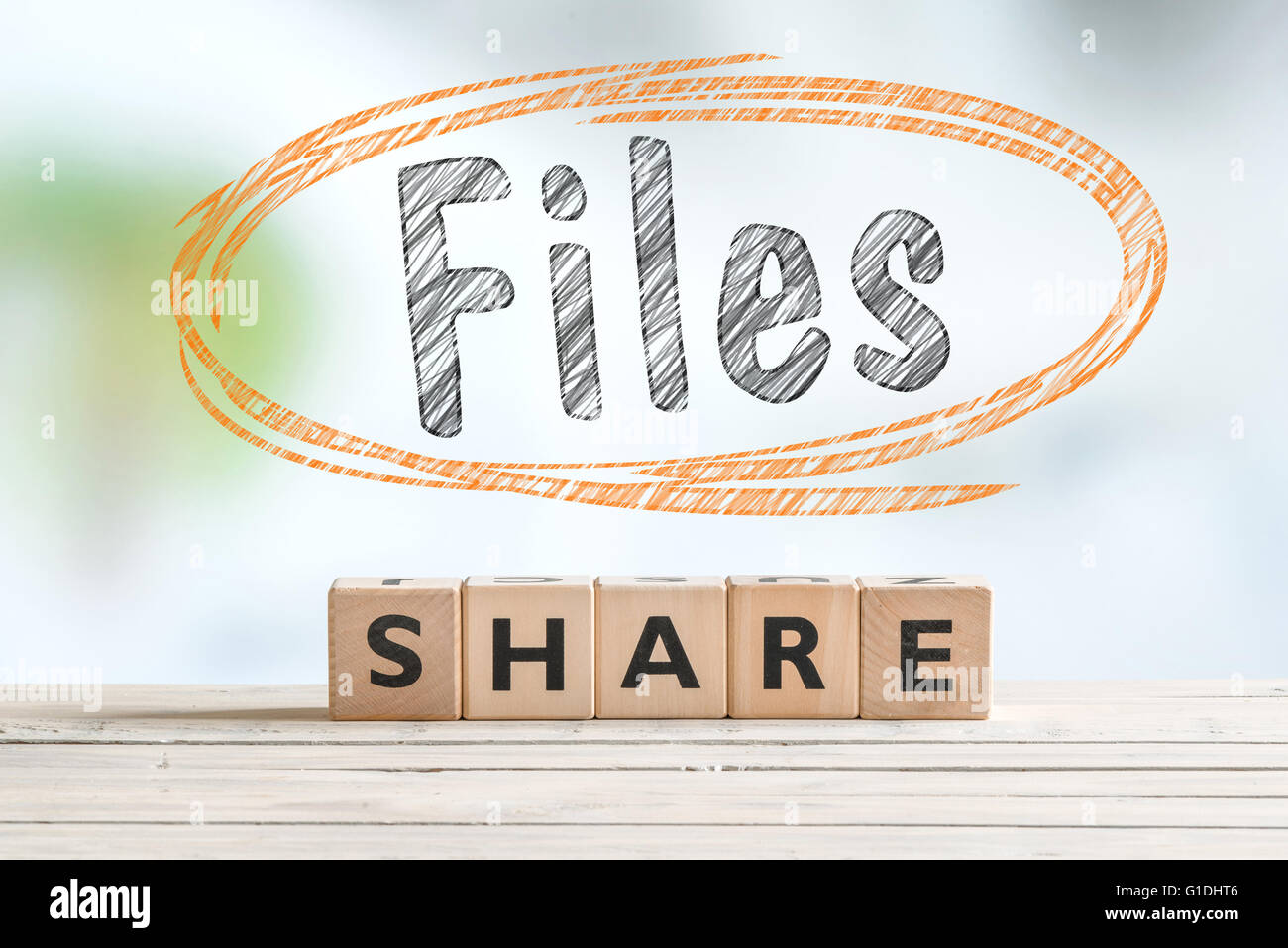 File sharing sign on a wooden table with a sketch Stock Photo - Alamy