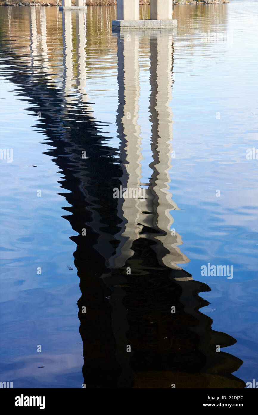 bridge reflection in water, Finland Stock Photo