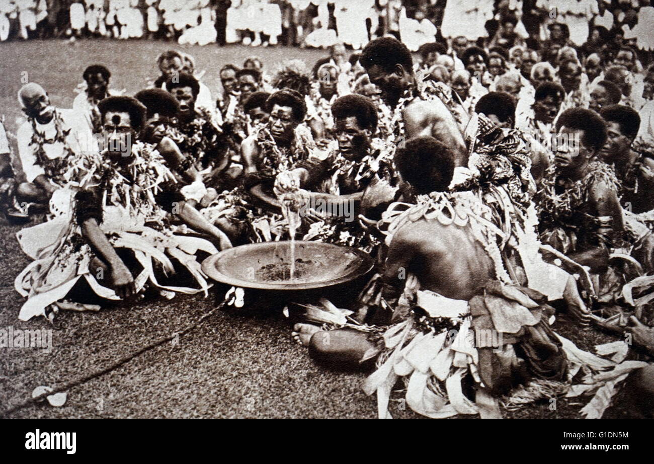 Photograph of a tribe preparing for a royal visit from Prince Albert Frederick Arthur George (1895-1952) and Lady Elizabeth (1900-2002) Suva, Fiji. Dated 20th Century Stock Photo