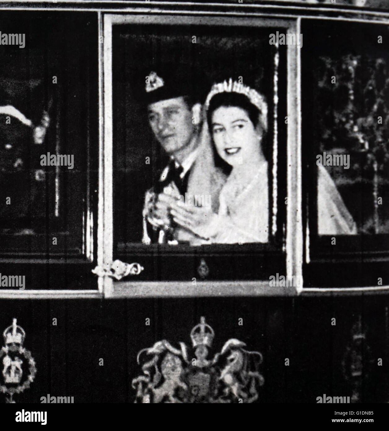 Photograph of Princess Elizabeth (1926-) and Prince Philip, Duke of Edinburgh (1921-) on their wedding day. Dated 20th Century Stock Photo