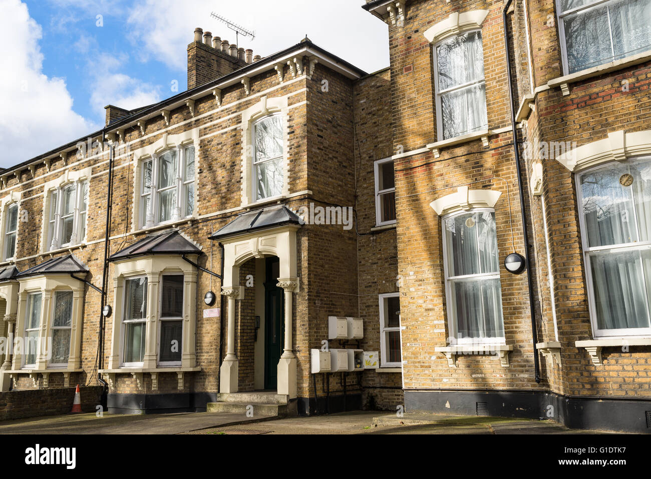 Facade of British Victorian family houses Stock Photo