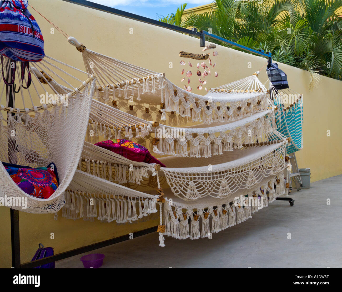 White string hammocks on display outside a shop in Todos Santos, Baja, Mexico. Stock Photo