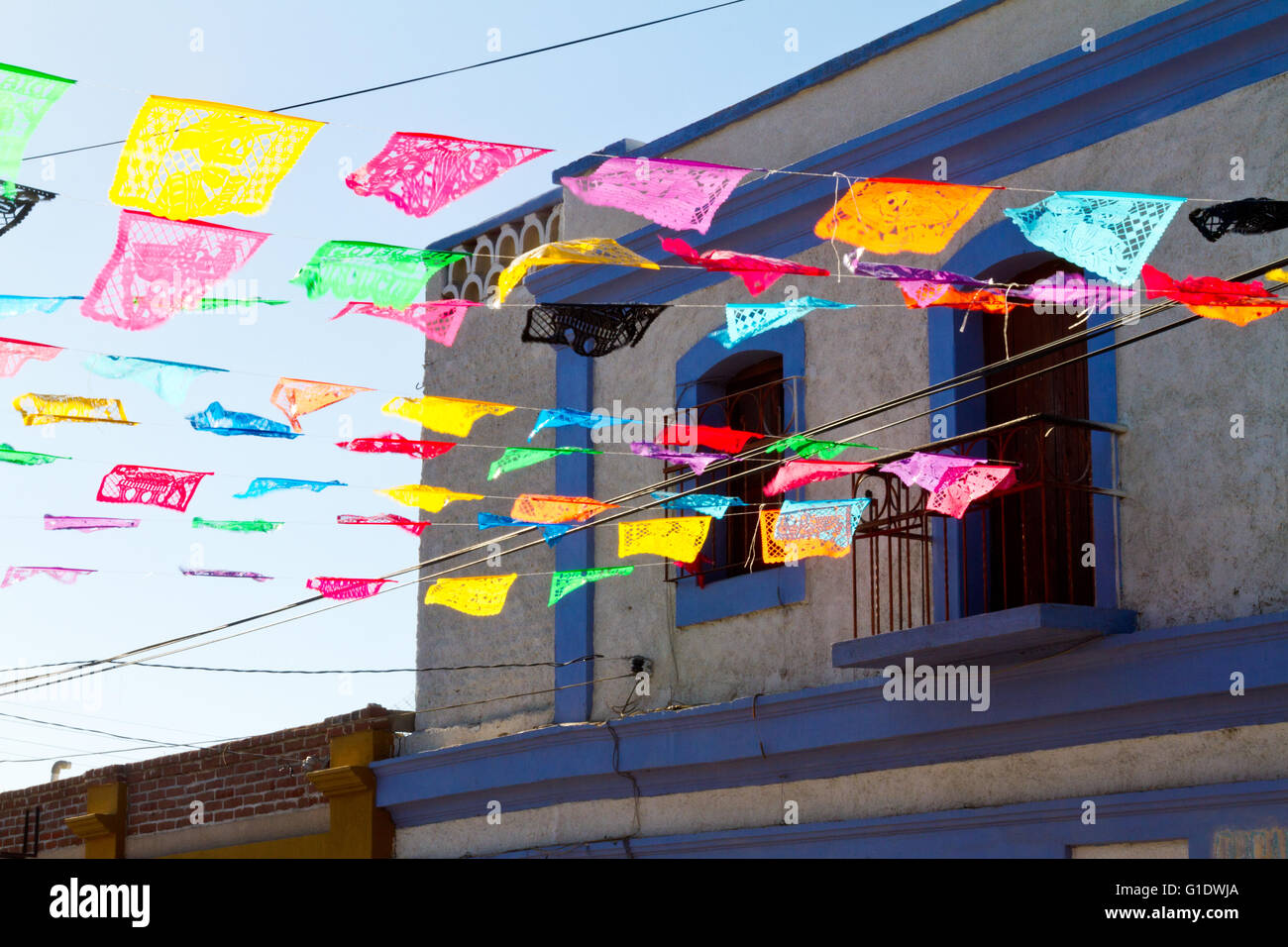 Papel picados, Mexican paper flags, announce a festival in Todos Santos, Baja Sur, Mexico. Stock Photo