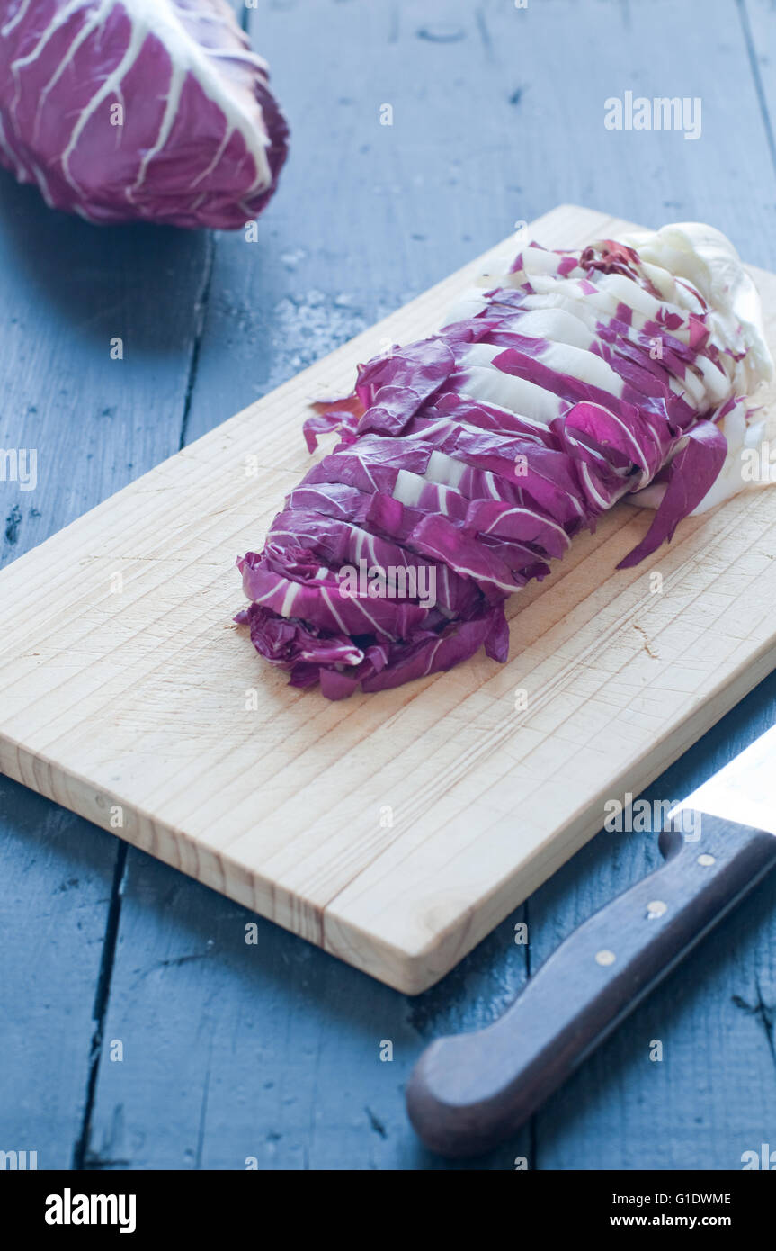 radicchio di Treviso red cut on a wooden cutting board,italy Stock Photo