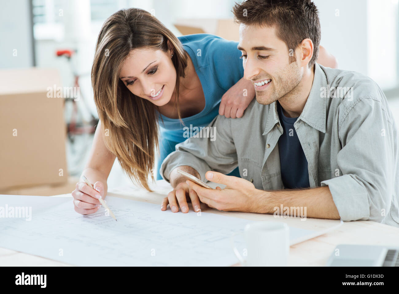 Couple desk hires stock photography and images Alamy