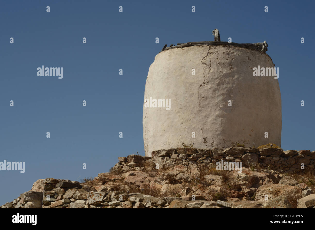 Landscape . Shot of an old windmill at Sikinos island , Cyclades , Greece . Stock Photo