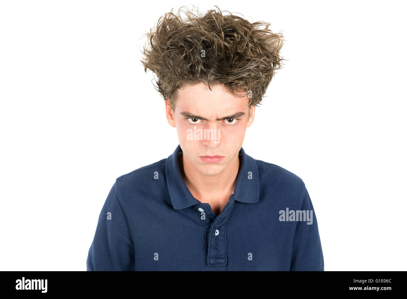 Angry Teenage Boy With Crazy Hair Isolated In White Stock Photo
