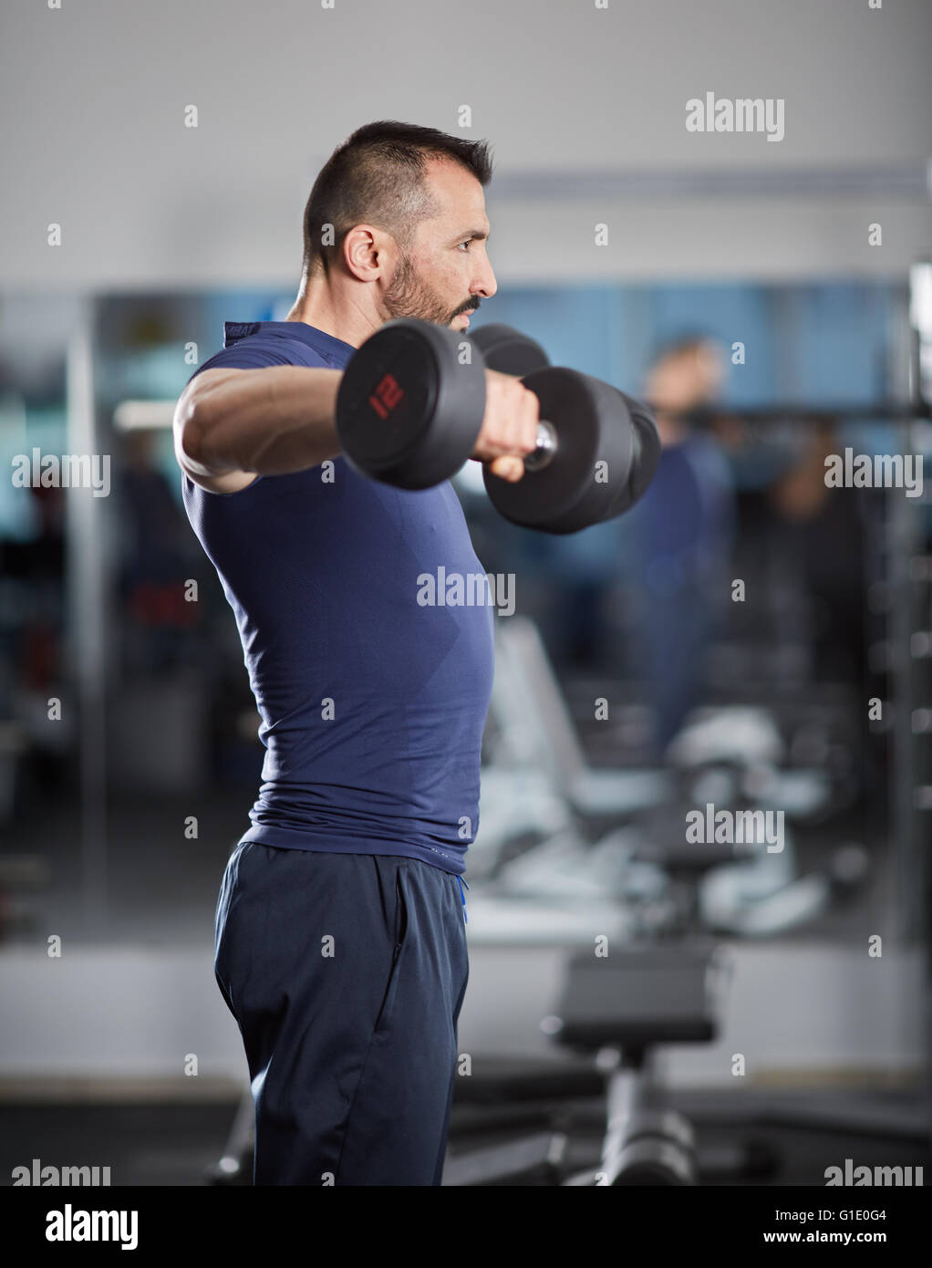 Man doing shoulder workout hi-res stock photography and images - Alamy