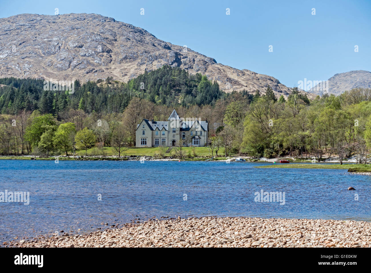 Glenfinnan House on the shore of Loch Shiel in Glenfinnan Highland Scotland Stock Photo