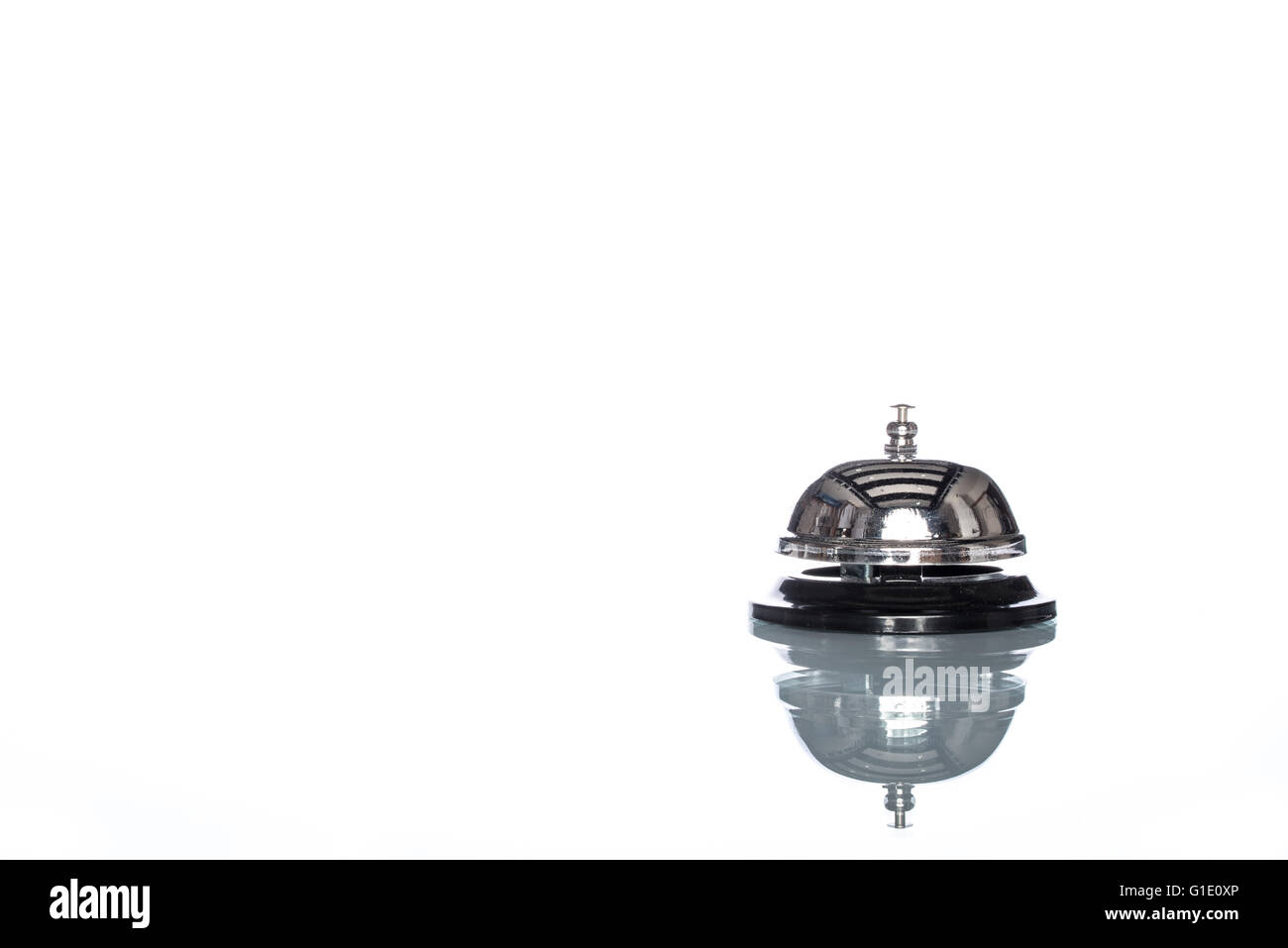 Service bell on white background,  customer demand, reflection Stock Photo