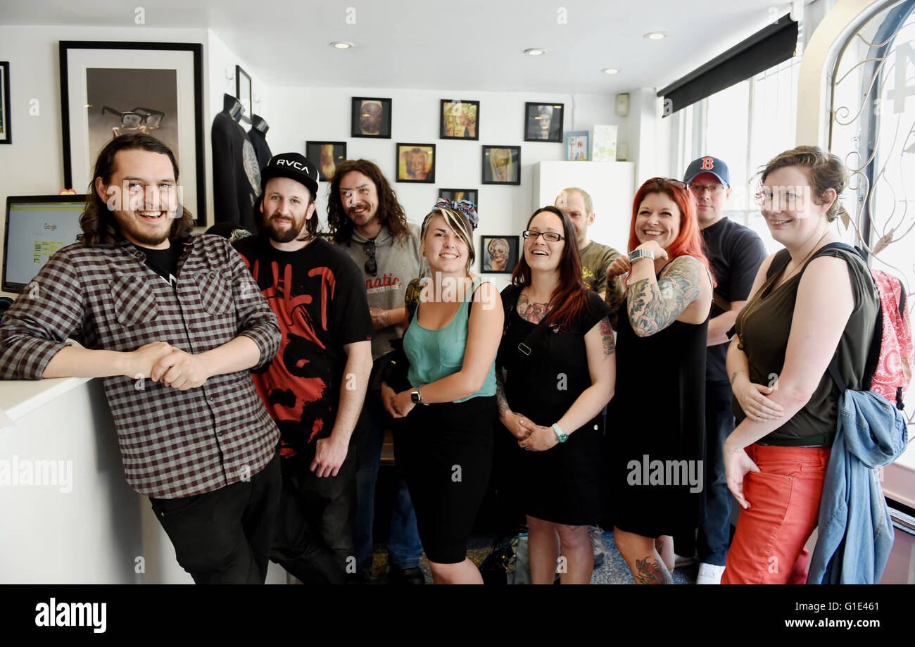 Brighton, UK. 13th May, 2016. Charity Tattoo event at Skinned Alive Tattoo in Brighton where they were being offered a 13 tattoo to celebrate the only Friday 13th of the year with all proceeds going to Cancer Research UK and Mind  Credit:  Simon Dack/Alamy Live News Stock Photo