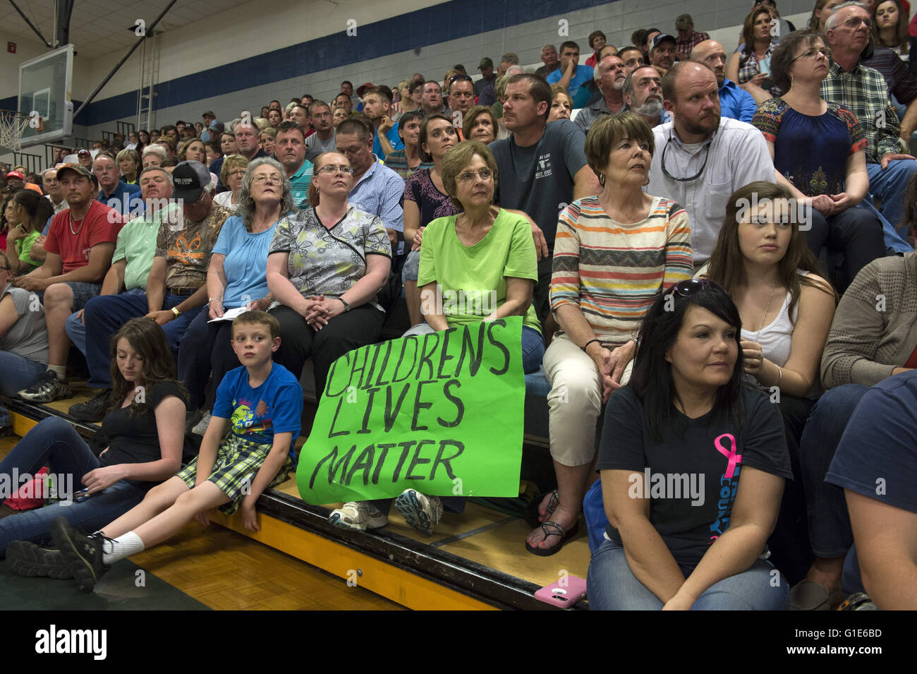 May 12, 2016 - Blue Ridge, GA - More than 500 residents of Fannin County, Georgia crowded into a high school cafeteria and gymnasium at a school board meeting to voice their opposition to any policy that allowed transgender students to use a gender-appropriate restroom in the schools. Several residents threatened to vote the board out of their positions if they set a policy that many other school systems deem fair to trans students. Local parents have vowed to remove their children from the schools if proposed laws are followed. If the school disregards anti-discrimination laws, the school s Stock Photo