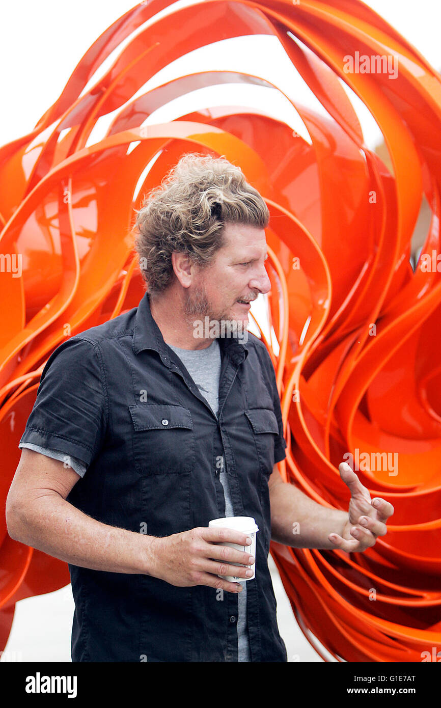 Napa, CA, USA. 11th May, 2016. Phoenix-based artist Pete Deise is seen near his sculpture at the South Napa Century Center on Wednesday morning following its installation. The sculpture weighs about 3,500 pounds is 14 feet long by 6 feet high and 28 inches wide. © Napa Valley Register/ZUMA Wire/Alamy Live News Stock Photo