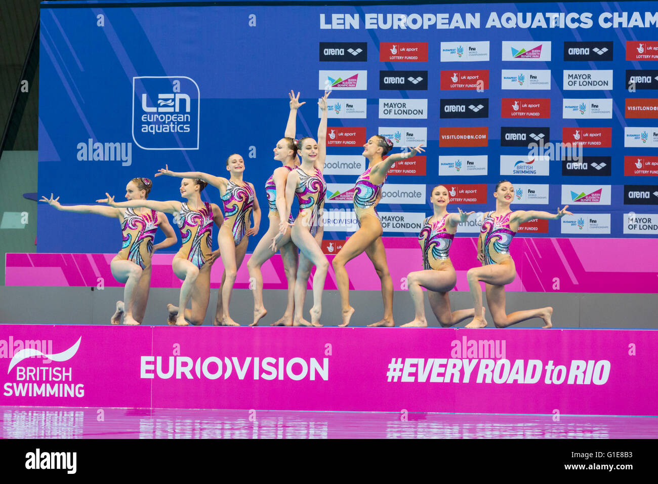 Aquatics Centre, Olympic Park, London, UK. 13th May 2016. The British Synchronised Swimming team present themselves to the judges before starting their routine in the water. The team from Ukraine win gold with 94.000 points overall, silver goes to Italy with 91.2333 points and bronze to Spain with 89.6667 points  in the Team Free Routine Synchronised Swimming Finals. Credit:  Imageplotter News and Sports/Alamy Live News Stock Photo