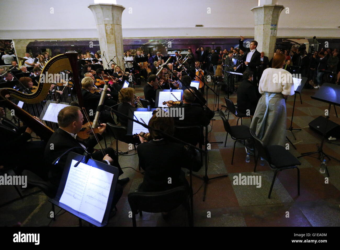 Moscow, Russia. 14th May, 2016. Musicians of the President's band of Russian Federation perform in the subway in Moscow, Russia, on May 14, 2016. An opera concert was held in Moscow subway to celebrate the subway's 81th anniversary. Credit:  Evgeny Sinitsyn/Xinhua/Alamy Live News Stock Photo