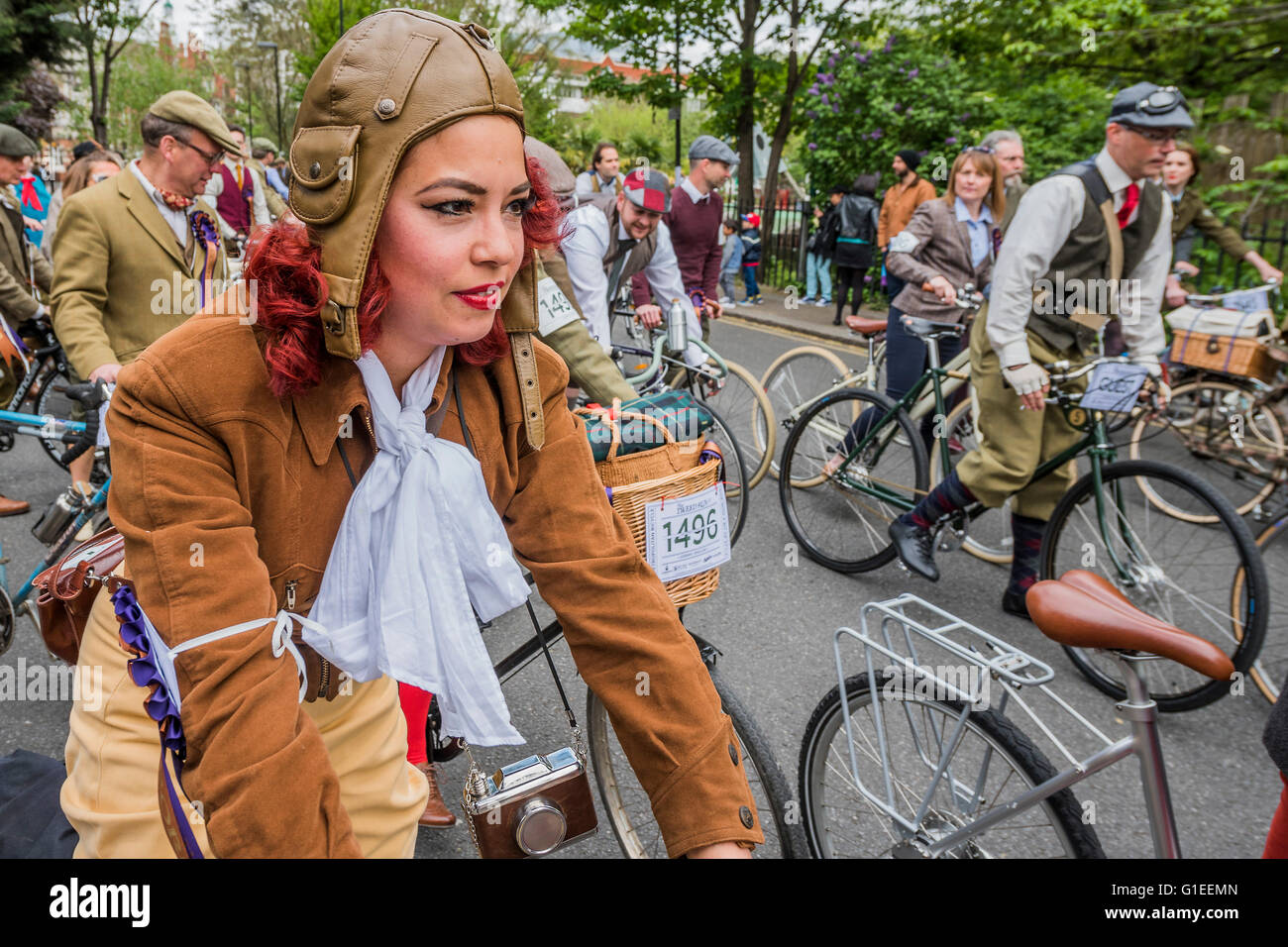 London, UK. 14th May, 2016. The Tweed Run, a very British public bicycle ride through London’s streets, with a prerequisite that participants are dressed in their best tweed cycling attire. Now in it's 8th year the ride follows a circular route from Clerkenwell via the Albert Memorial, Buckinham Palace and Westminster. Credit:  Guy Bell/Alamy Live News Stock Photo