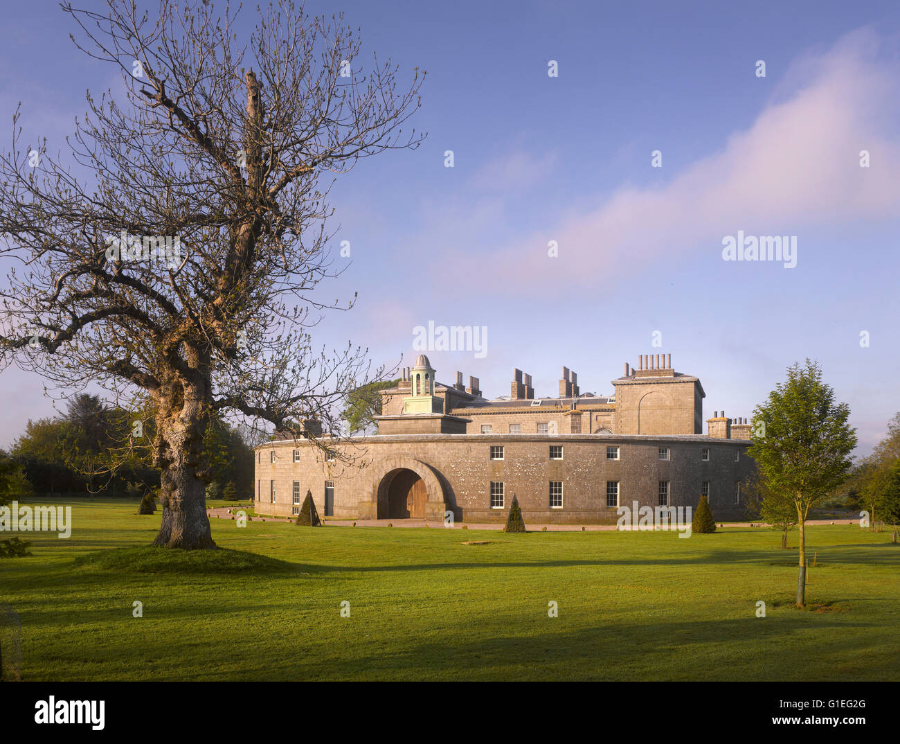 Cairness House, Fraserburgh, Aberdeenshire, Scotland. View of the circular exterior and the expansive grounds of Cairness House. Stock Photo