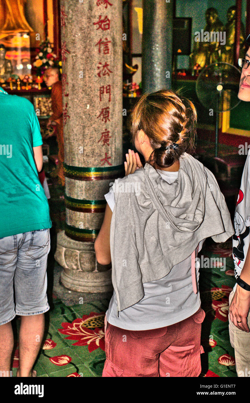 Buddhists enter the temple to worship and pray during Chinese New Year