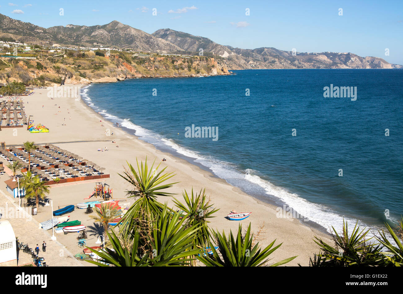 Playa Burriana sandy beach at popular holiday resort town of Nerja, Malaga province, Spain Stock Photo