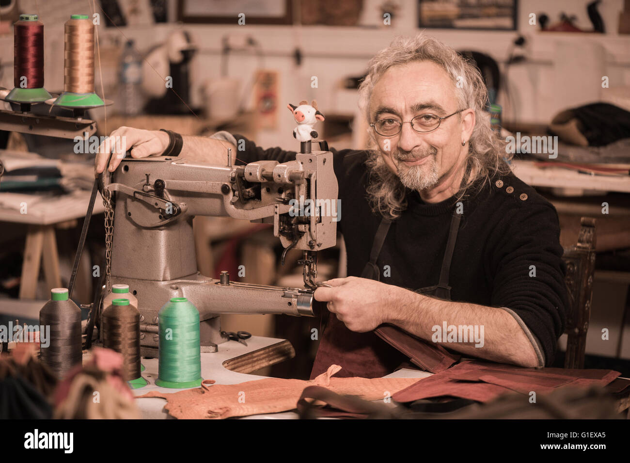 leather goods craftsman at work in his France Stock Photo Alamy
