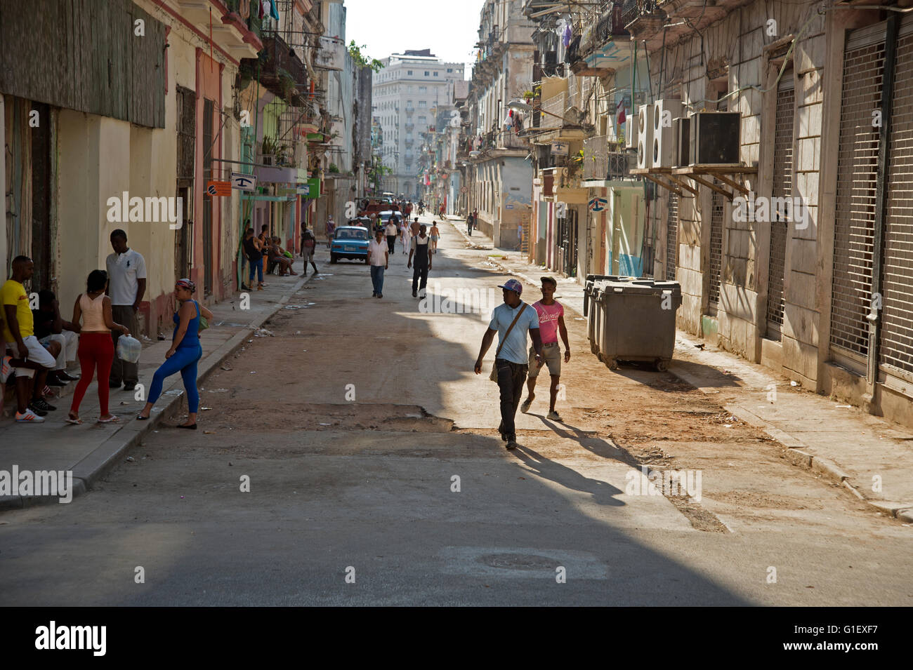 Cubans go about their daily lives in the crumbling buildings in Centro Havana Cuba Stock Photo