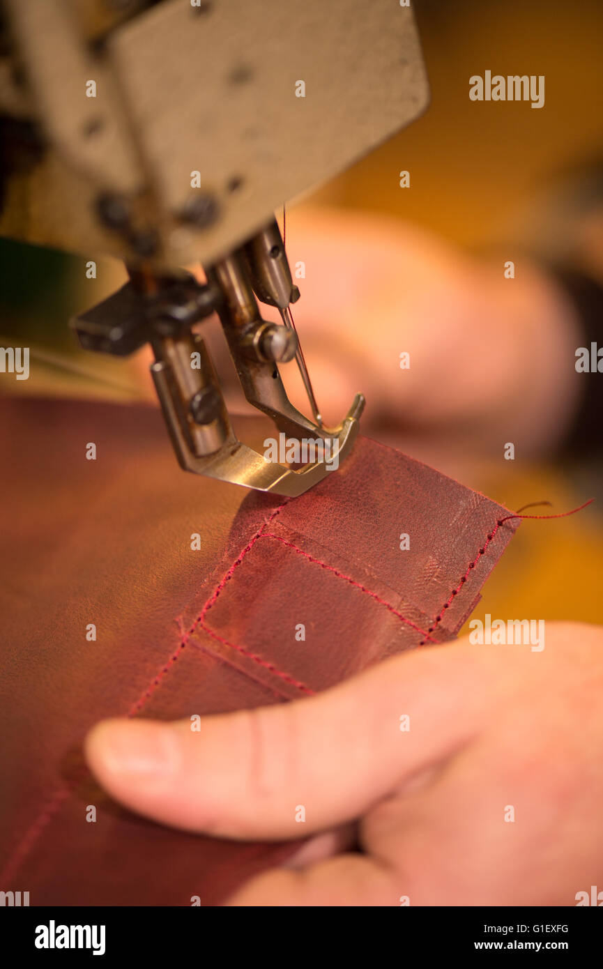 Leather Goods Craftsman At Work In His Stock Photos & Leather