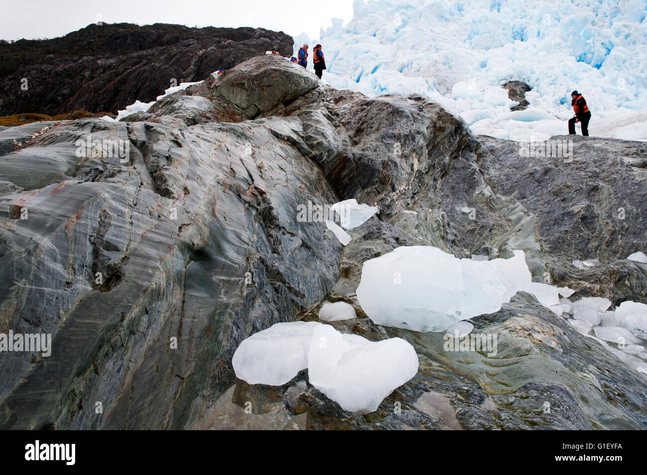 Tourists hiking Brujo Glacier Asia Fjord Patagonia Chile Stock Photo