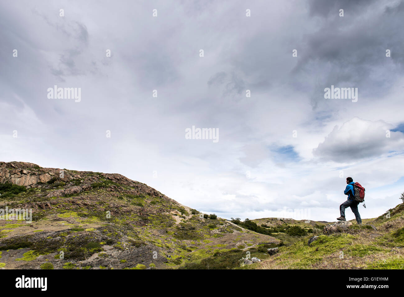 Man on the mountain Torres del Paine National Park Chilean Patagonia Chile Stock Photo