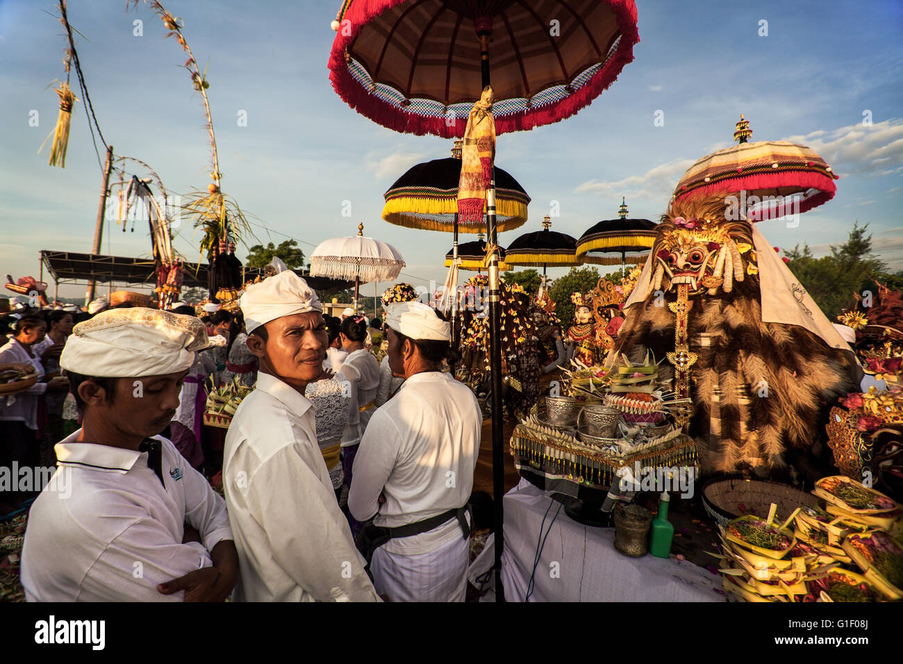 Rangda of Balinese mythology is worshiped by many people performing rituals  at the Melasti Ceremony in Bali Stock Photo