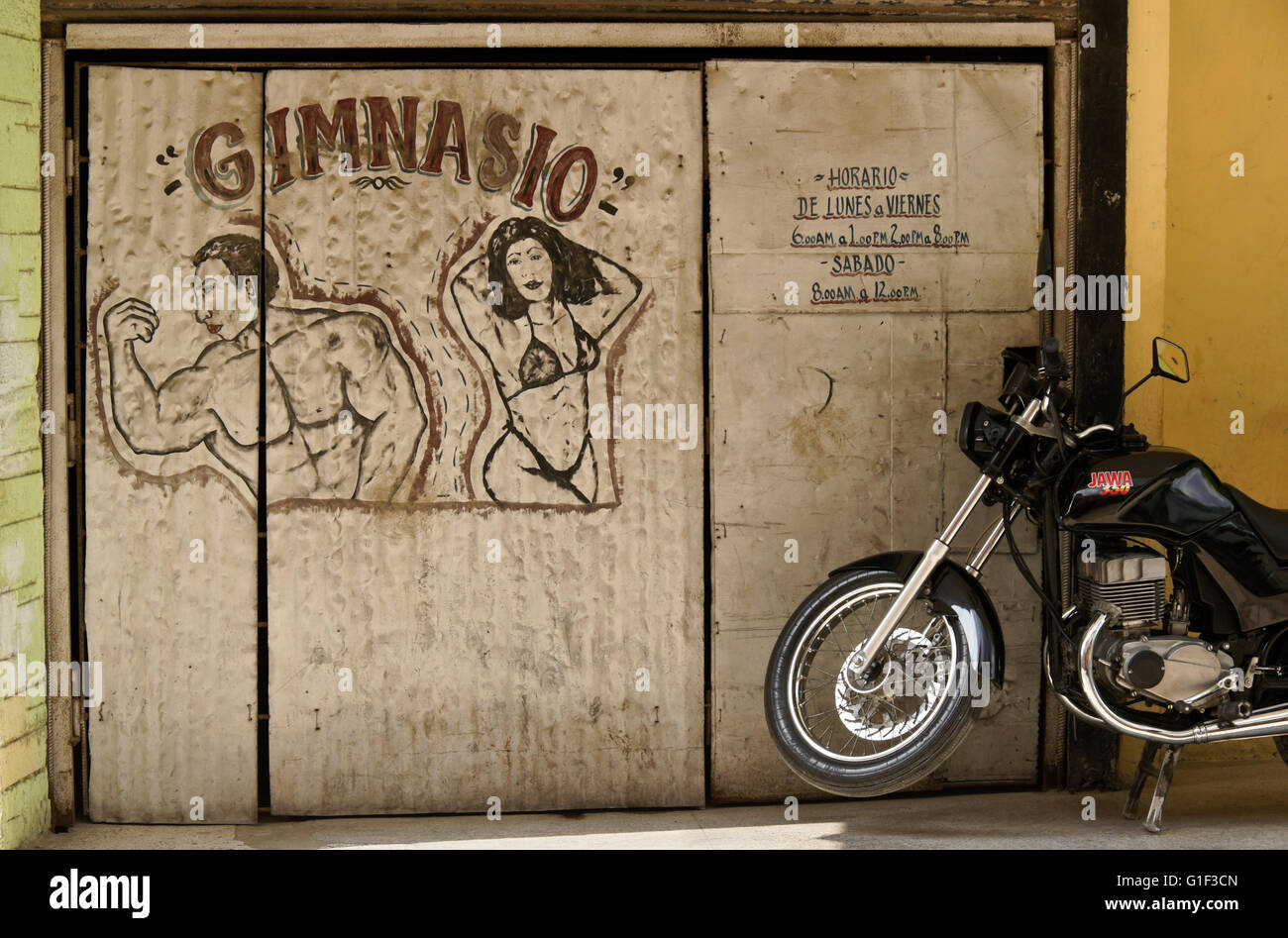 Gym and motorcycle parked outside, Havana, Cuba Stock Photo Alamy